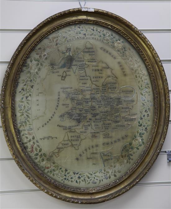 A 19th century oval needlework map sampler, oval sampler 24 x 21.5in.